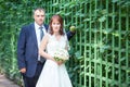 Wedding People With Green Fenc...