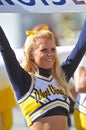 West Virginia cheerleader holding sign