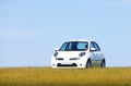 White Car On A Hill