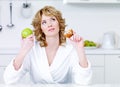 Woman Choosing Between Healthy...