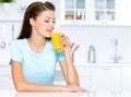Woman Drinks Of Fresh Orange J...