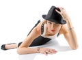 Woman lying on the floor and hold your black hat