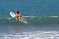 Woman Paddling a Surfboard in Costa Rica