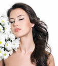 Woman Relaxing With Flowers