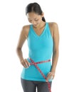Woman In Sports Clothing Measu...