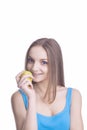 Young Caucasian Girl Wearing Brackets with apple