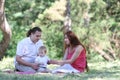 Young Family On Nature