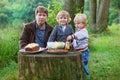Young Father And Two Little Bo...