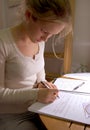 Young female studying. Royalty Free Stock Photos