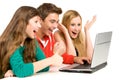 Young People Looking At Laptop