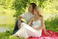 A Young Pregnant Couple On Nat...