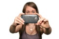 Young woman is taking photos with the mobile phone camera isolated on white background Stock Images