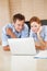 A lovely couple with a laptop