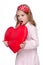 Little girl with a large toy heart
