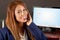 Communication: Woman talking on a headset