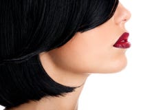 Beautiful woman with  sexy red lips and shot black hairs Royalty Free Stock Photography