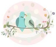 Couple of birds in love on a branch Stock Image