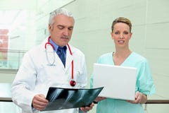 Doctor With His Assistant Stock Photography -