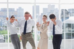 Group of business people raising arms as a success Stock Photography