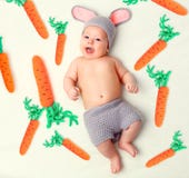 اطفال رائعة وتلقائية 2013 2014 happy-baby-child-costume-rabbit-bunny-carrot-whit-white-background-67359007.jpg