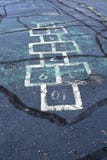 hopscotch-grid-cracked-pavement-yellow-c