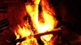 killing-time-concept-abstract-blend-old-fashioned-clock-hearth-fire-41137089.jpg