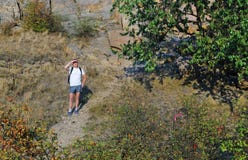 Man out backpacking on a mountain path Stock Photography