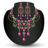Of necklace with pink jewels and earrings Stock Photo