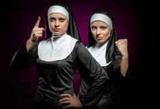 [Image: nuns-two-attractive-young-indoors-30532164.jpg]