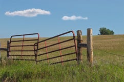 Royalty Free Stock Photo: Old and new windmills in a rural pasture