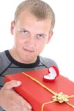 man staring at wedding ring