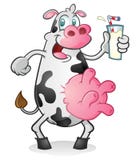 Retro cow drinking milk Royalty Free Stock Photography