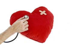 Female Medical Professional Checking Childs Heart Royalty Free Stock Photo - Image: 1638185