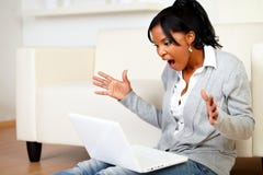 http://thumbs.dreamstime.com/t/surprised-young-woman-browsing-internet-25851007.jpg
