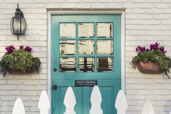 Teal front door of a classic home Stock Images