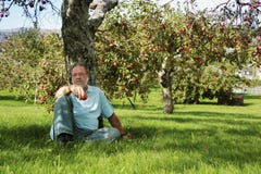 Under the apple tree Stock Photos