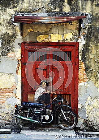 “Boy on a Bike” Mural, the Street art in Penang, Malaysia