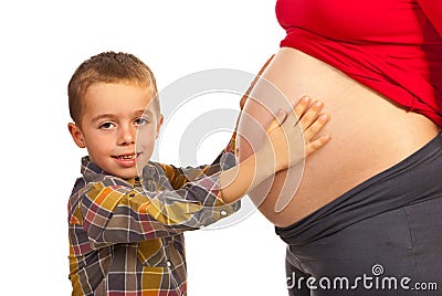 涉及他怀孕的母亲腹部的男孩 库存照片 - 图片