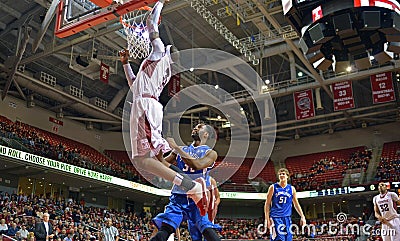 2013 NCAA Basketball - slam dunk from floor - wide angle