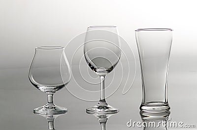 3 empty glasses in different style