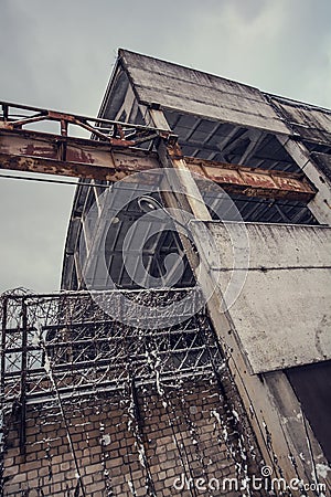 Abandoned ghost factory wall and fence