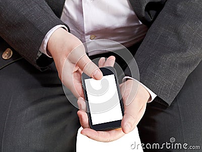 Above view of mobile phone in businessman hand