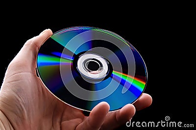 Abstract cd dvd blue-ray disk in hand