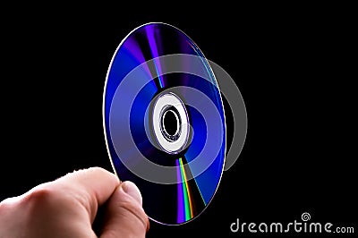 Abstract cd dvd blue-ray disk in hand