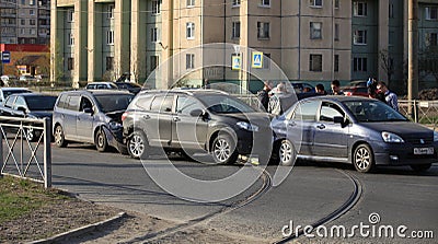 Accident involving four cars at a crosswalk