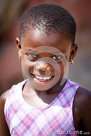 ACCRA, GHANA � MARCH 18: Unidentified African girl pose with sm
