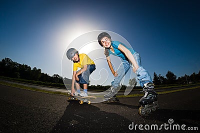 Active young people - rollerblading, skateboarding