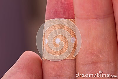 Adhesive Bandage on Index Finger