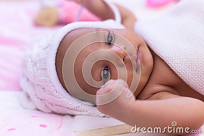 Adorable little african american baby girl looking - Black peopl