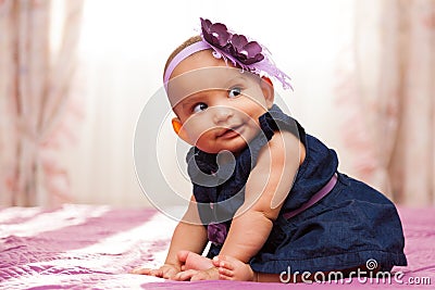 Adorable little african american baby girl looking - Black peopl